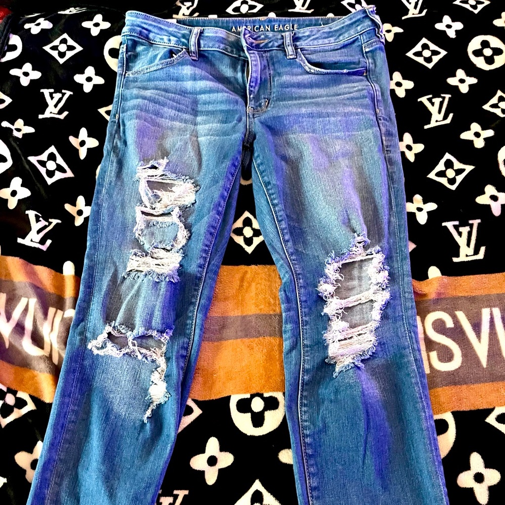 Size 12 jeans AE  NEXT LEVEL STRECH  distressed short raw hem jeans
